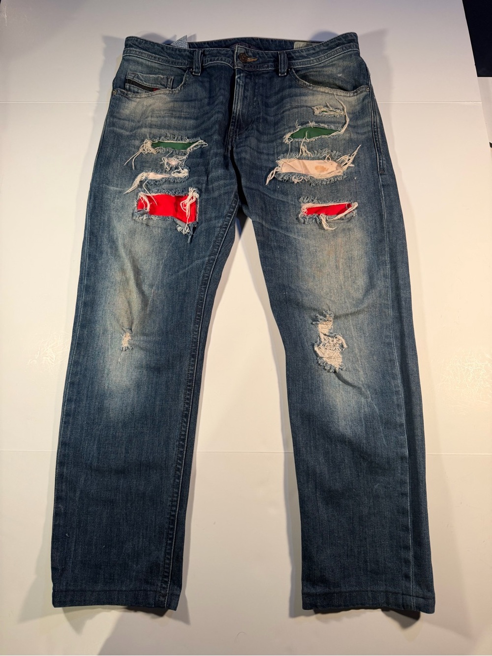 Diesel Men's Blue Relaxed Jeans with Red, Green & Cream Patch Accents